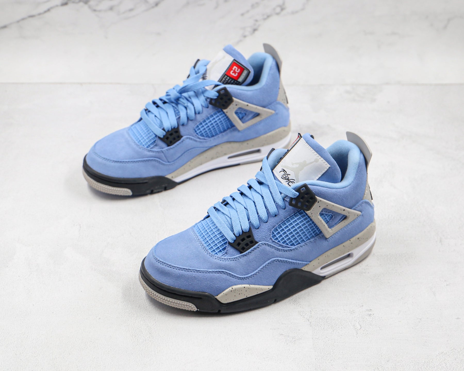 Jordan 4 Retro University Blue - Luxe Premium Brazil