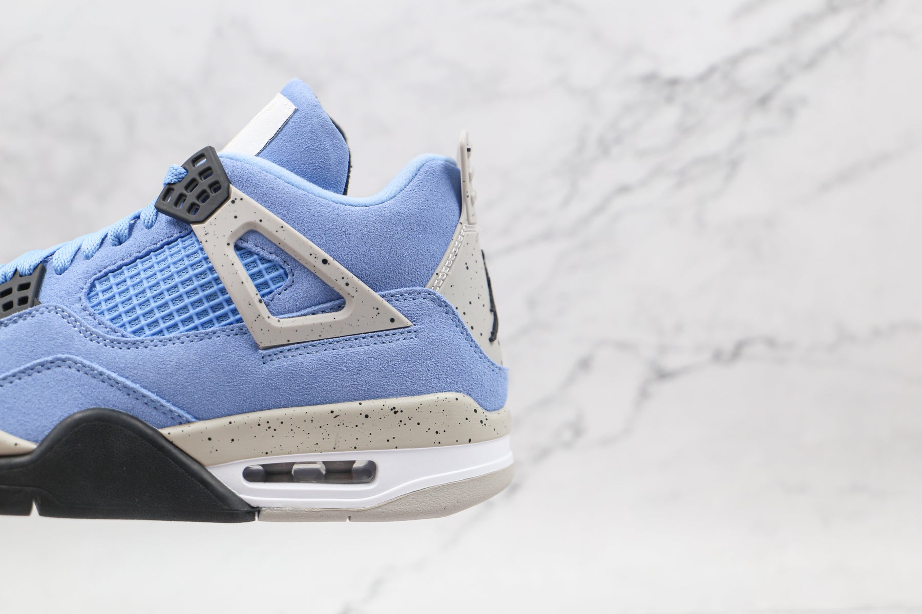 Jordan 4 Retro University Blue - Luxe Premium Brazil