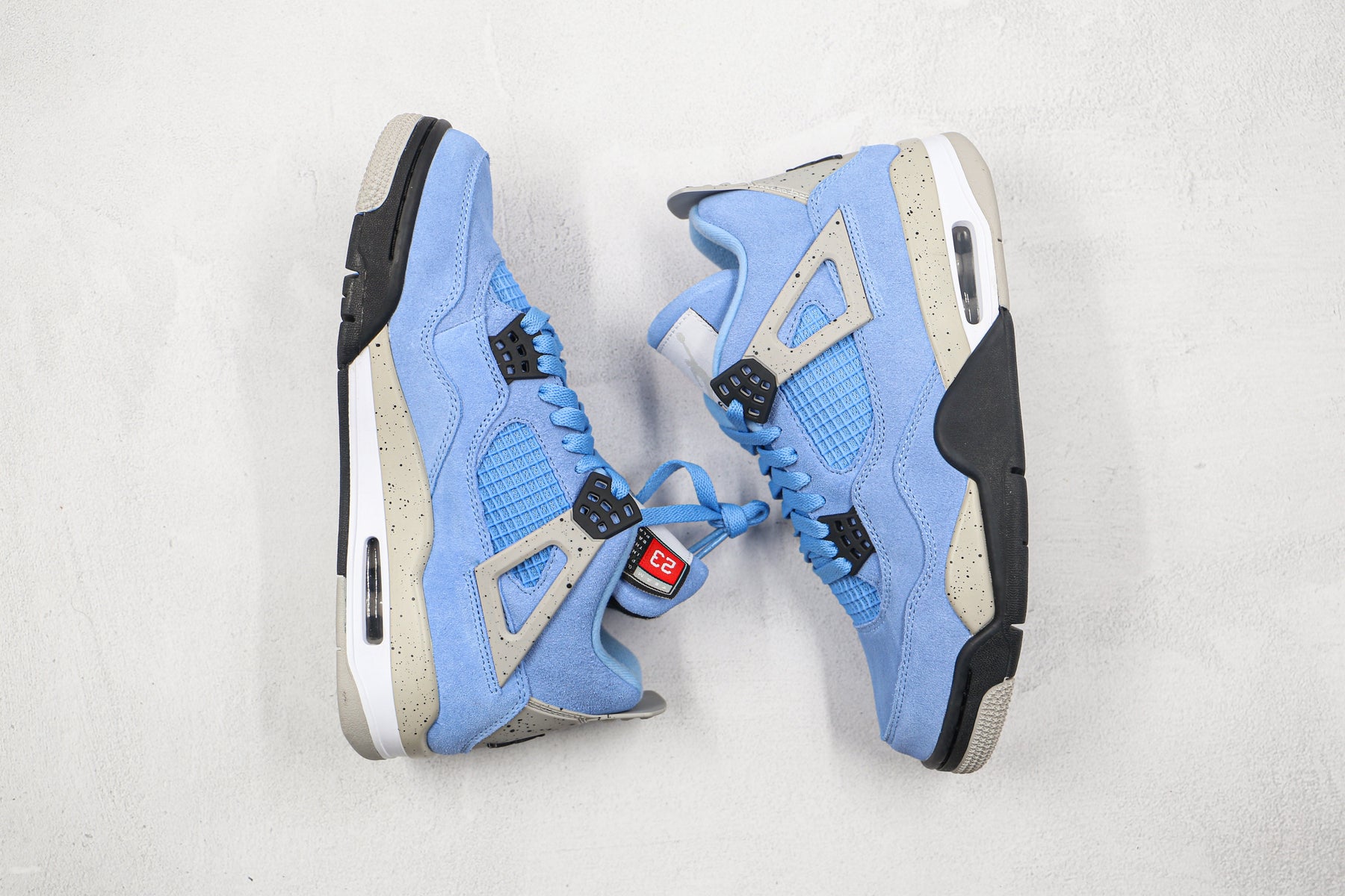 Jordan 4 Retro University Blue - Luxe Premium Brazil