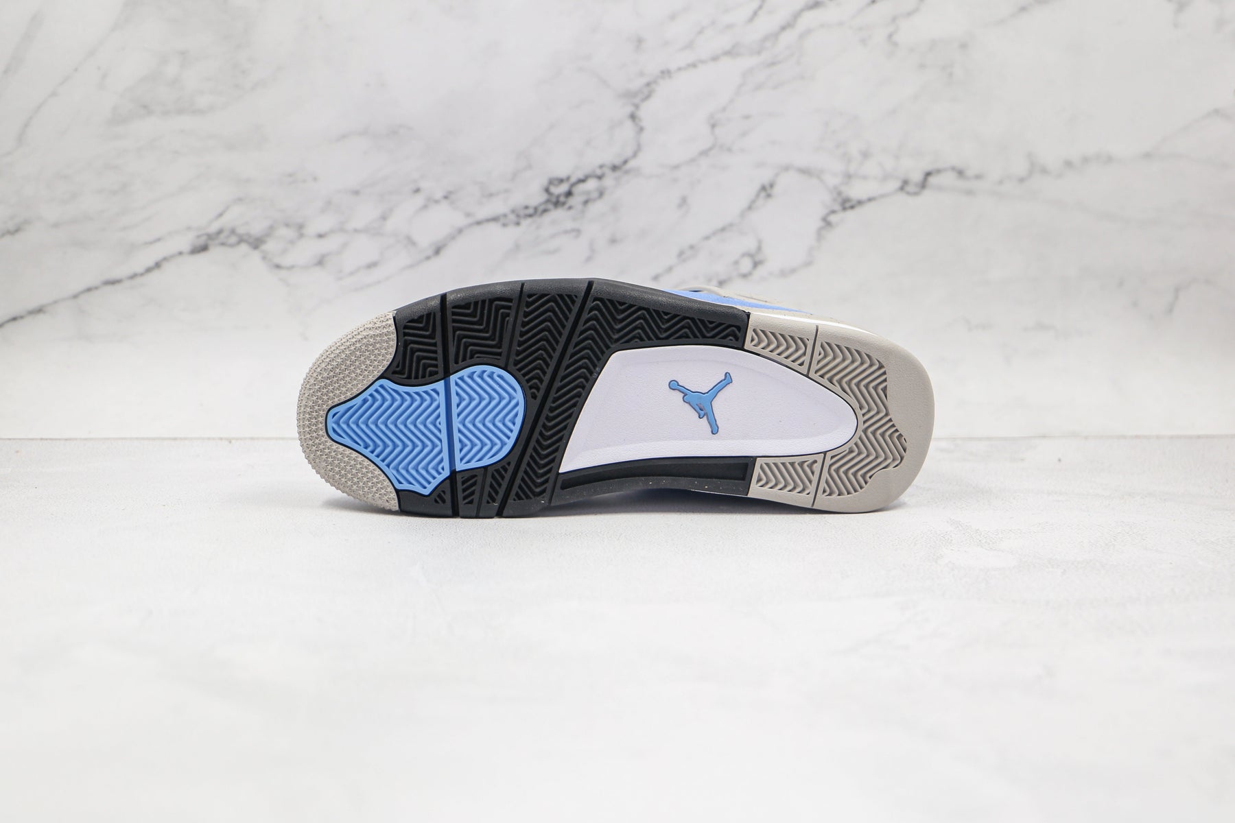 Jordan 4 Retro University Blue - Luxe Premium Brazil