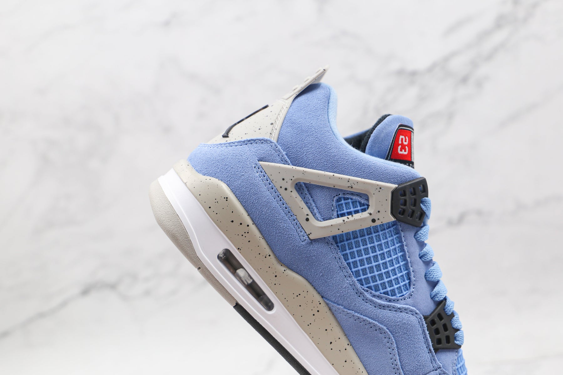 Jordan 4 Retro University Blue - Luxe Premium Brazil